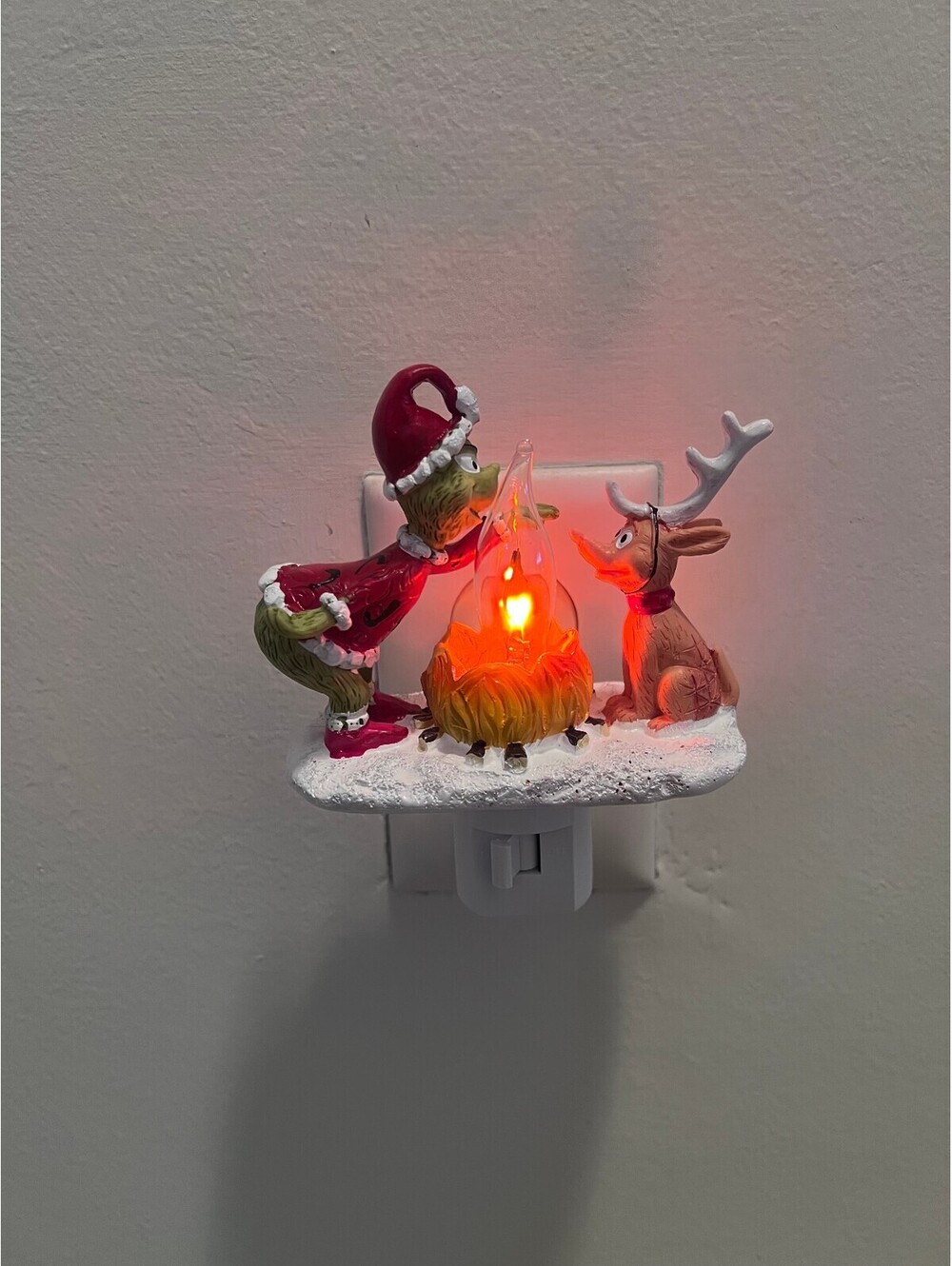 The Grinch and Reindeer Christmas Night Light Plug-In fire